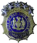 Insigne du commissaire, plus haut gradé du NYPD.