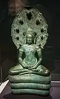 12th century Khmer bronze Naga-enthroned Buddha from Banteay Chhmar, Cambodia