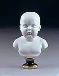 Napoléon II à six mois, d'Alexandre Brachard et Jean-Jacques Oger, d'après Henri-Joseph Ruxthiel (biscuit, 1811)