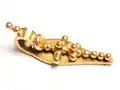 Un mangalsutra avec une croix aux 21 perles utilisée par les chrétiens de saint Thomas au Kerala.