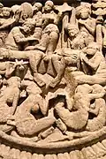 Asita visite le Bouddha nouveau-né. Sculpture en calcaire de style Satavahana, Ier et IIe&nbsp;siècles apr. J.-C.. En provenance d'Amaravati.