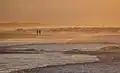 Une plage de Nørre Vorupør au soleil couchant.
