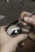 Boule Obut sertie de diamants par Tournaire.