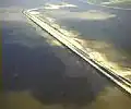 L’Escaut occidental (Oosterschelde) au premier plan, l’Oesterdam et le canal de l'Escaut au Rhin, le Markiezaatskade peut être deviné en haut à gauche. Source:beeldbankvenw