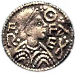 Avers d'une pièce en argent avec un buste d'homme de profil.