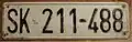 Plaque de Skopje en usage à l'époque yougoslave (l'étoile rouge a été repeinte en blanc).