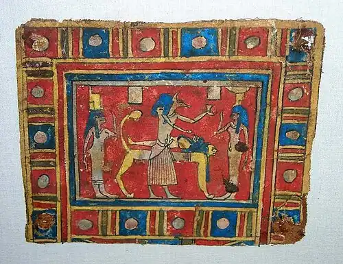 Osiris sur son lit funéraire, cartonnage de momie, époque ptolémaïque.