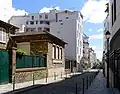 Partie nord de la rue, après la place de la Réunion.