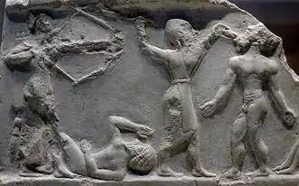 Scène de combat, détail d'une stèle fragmentaire du règne de Rimush ou de Naram-Sin, musée du Louvre.