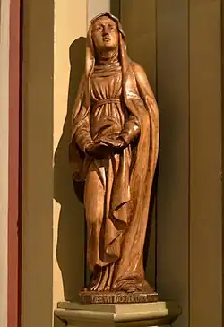 Statue en bois.