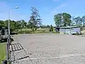 Un paddock de sable en sport équestre.