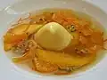 Fruits de la passion, panna cotta, mangue, orange et zeste d'orange au muscat de Beaumes-de-Venise
