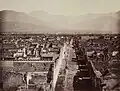 Panorama de Pompéi avec le mont Vésuve en arrière-plan, vers 1870