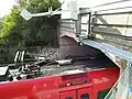 Un scanner contrôle le pantographe d’un train qui passe.
