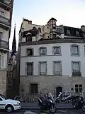 La rue vue du quai aux Fleurs.