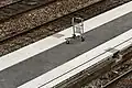 Caddie de gare ou aérogare pour transport de valises.