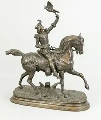Fauconnier sur un cheval richement décoré (bronze patiné sur socle à relief oblong).