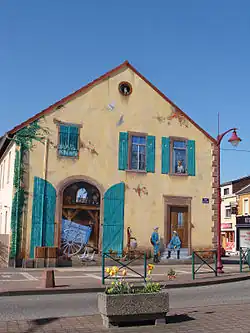 Fresque d'Éric Haven, place du Marché.
