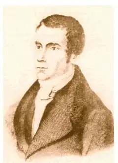 Gravure en sépia représentant le buste de Schmerling de trois quarts gauche. Il porte les cheveux courts et des petits favoris ; il est vêtu d’une redingote à très large col.