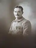 Le soldat Camille Bec, cycliste du 416e&nbsp;RI décoré de la médaille militaire et de la croix de guerre avec palme et étoile de bronze, fin 1918.
