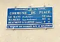 Plaque de cocher de la commune.