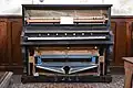 Piano harmonium vers 1900.