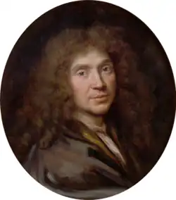 Peinture ovale en couleur. Buste d'homme de profil, portant perruque, regardant le spectateur.