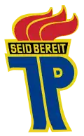 Insigne des Pionniers est-allemands (inscription : « Sois prêt ! »)
