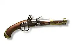 Pistolet à silex du XIXe siècle, vu de profil.