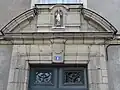 Porte de l'immeuble au numéro 1, côté sud