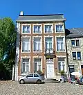 Maison (façade avant et pan de toiture, mur de clôture, portail, décor du salon du côté de la place St-Georges), place Saint-Georges n°36