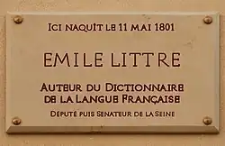 N°21 : plaque au no&nbsp;21(date de naissance erronée).