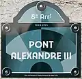 Une des deux plaques du pont témoignant des JO 2024.