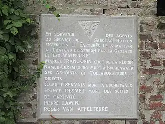 plaque commémorative de la capture de membres du Groupe D du Service de Sabotage Hotton par la Gestapo en 1944. (apposée rue de Branchon, 111)