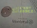 Plaque de conduits avec une inscription à portée écologique.