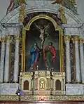 Tableau de la crucifixion sur le retable du maitre-autel