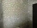 Mur sud en arête-de-poisson.