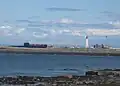 Le sous-marin NCSM Onondaga et le phare de Pointe-au-Père.