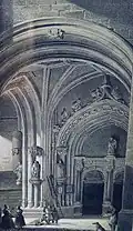 Le porche et ses statues , collégiale de Dole.