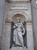 Statue de Saint Alexandre dans une niche en cul de four