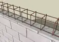 Déposer le chaînage sur le mur.