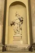 Allégorie de Glume à gauche de l'entrée