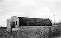 Nissen hut à Port Lincoln, Australie du Sud, en cours de conversion en l'église presbytérienne John Calvin au début des années 1950. Il a été démoli à la fin des années 1960.
