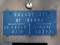 Panneau sur la maison éclusière.