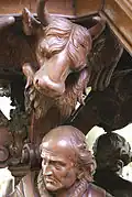 Détail de la chaire : saint Luc et son animal symbolique, le taureau