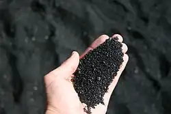 Sable volcanique d'une plage de Hawaï.