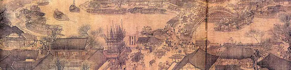 Dessin représentant une ville traversée au milieu par un fleuve. Au centre de l'image, un pont enjambe le cours d'eau. De nombreuses personnes sont dans les rues et sur le pont.