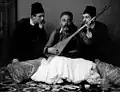 Musicien, vers 1880.