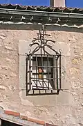 Grille (Reja) traditionnelle avec des ornements zoomorphes à Prádena.