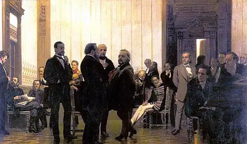 Tableau représentant entre 20 et 30 hommes debout ou assis dans une salle très éclairée.